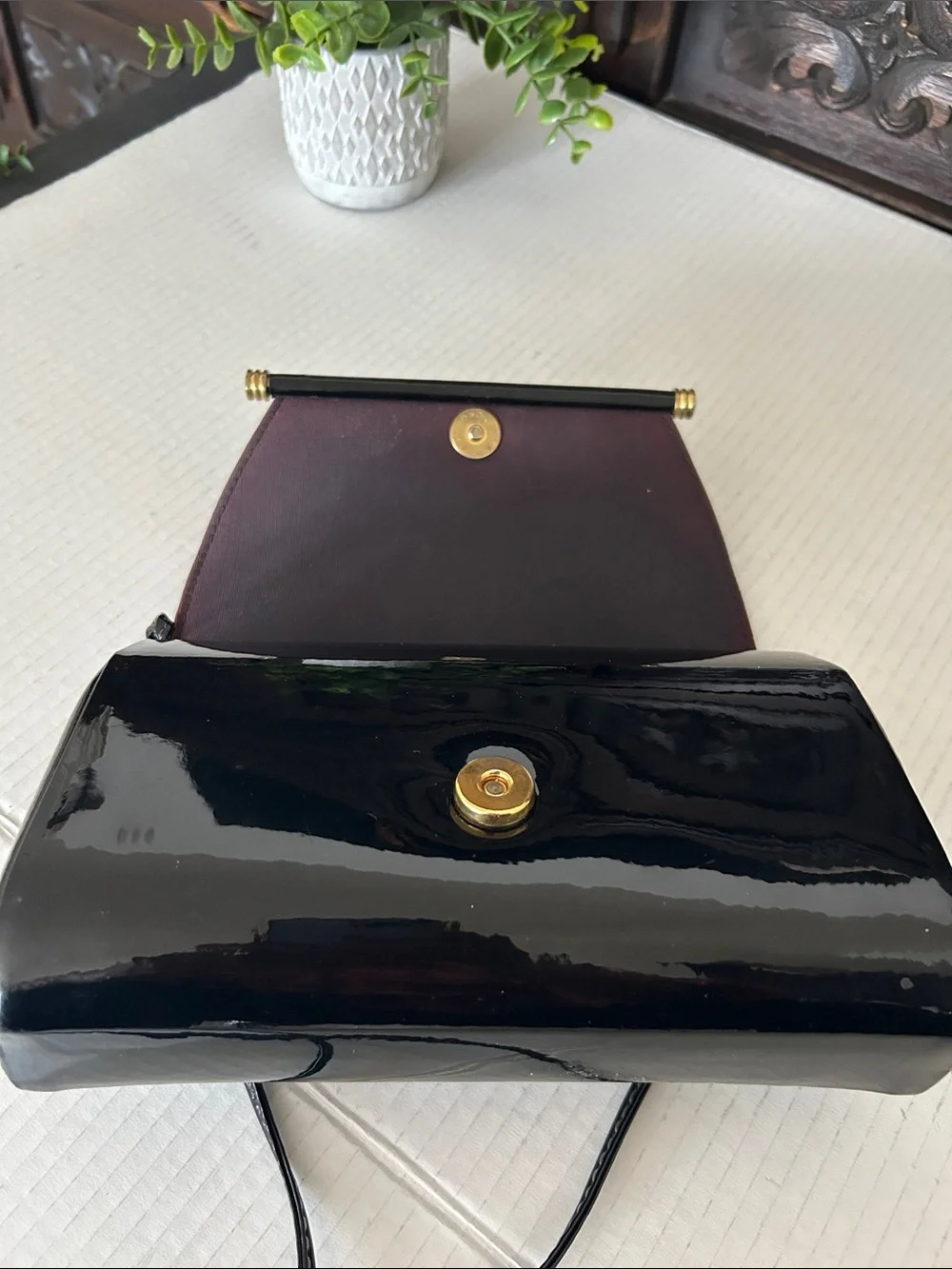 Ande Sleek Black Patent Crossbody with Gold Accent